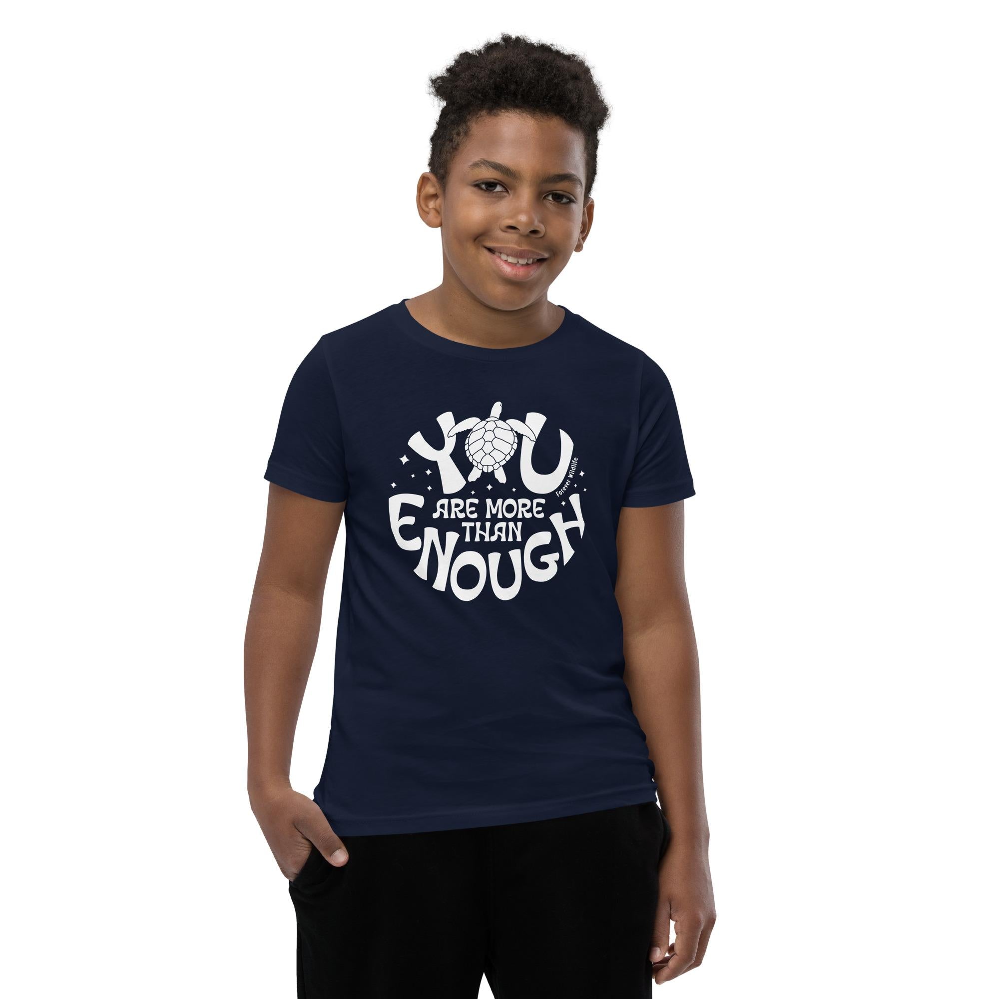 Teen wearing Navy Sea Turtle Youth T-Shirt with Sea Turtle graphic as part of Wildlife T Shirts, Wildlife Clothing & Apparel by Forever Wildlife