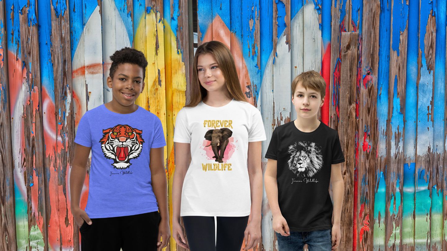  Youth wearing Youth T-Shirts with animals on them as part of Wildlife Clothing & Apparel by Forever Wildlife in front of surfboards