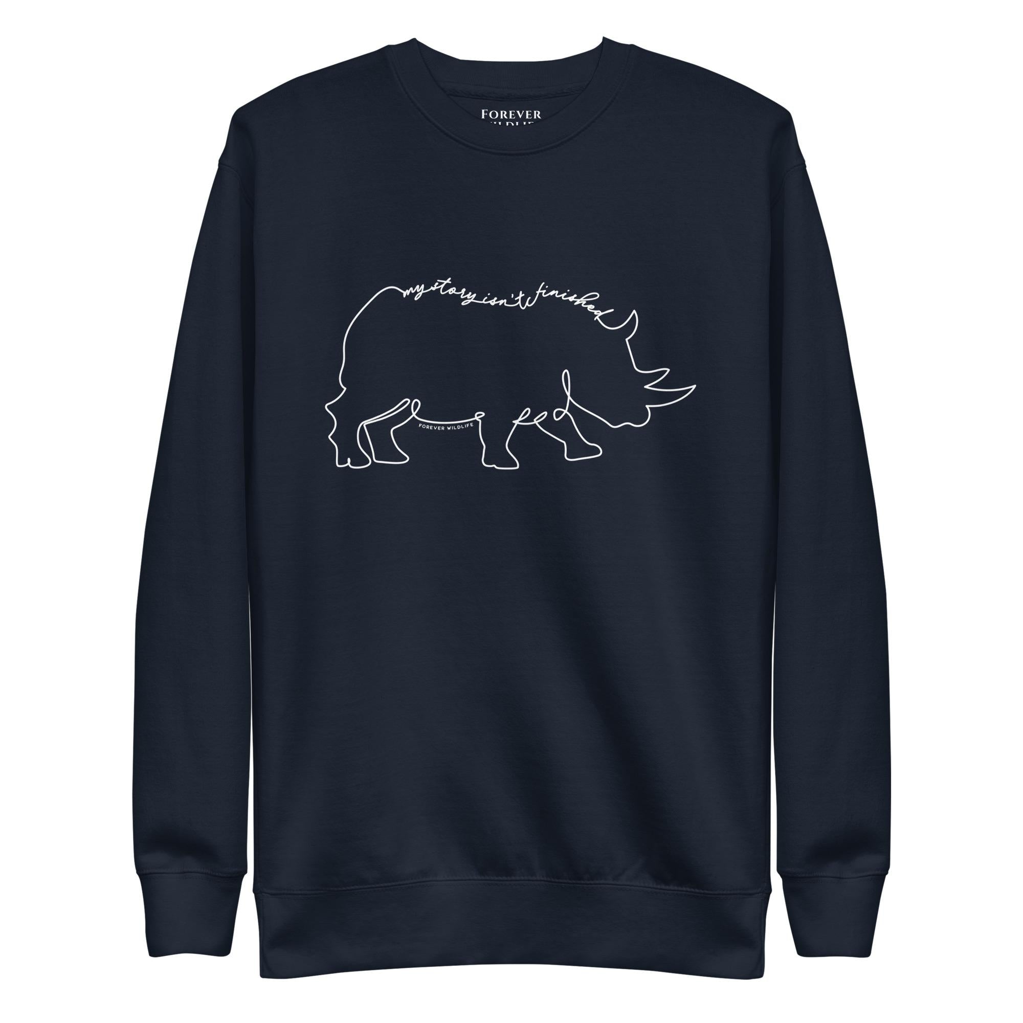 Rhino Sweatshirt in Navy-Premium Wildlife Animal Inspiration Sweatshirt Design with 'My Story Isn't Finished' text, part of Wildlife Sweatshirts & Clothing from Forever Wildlife.