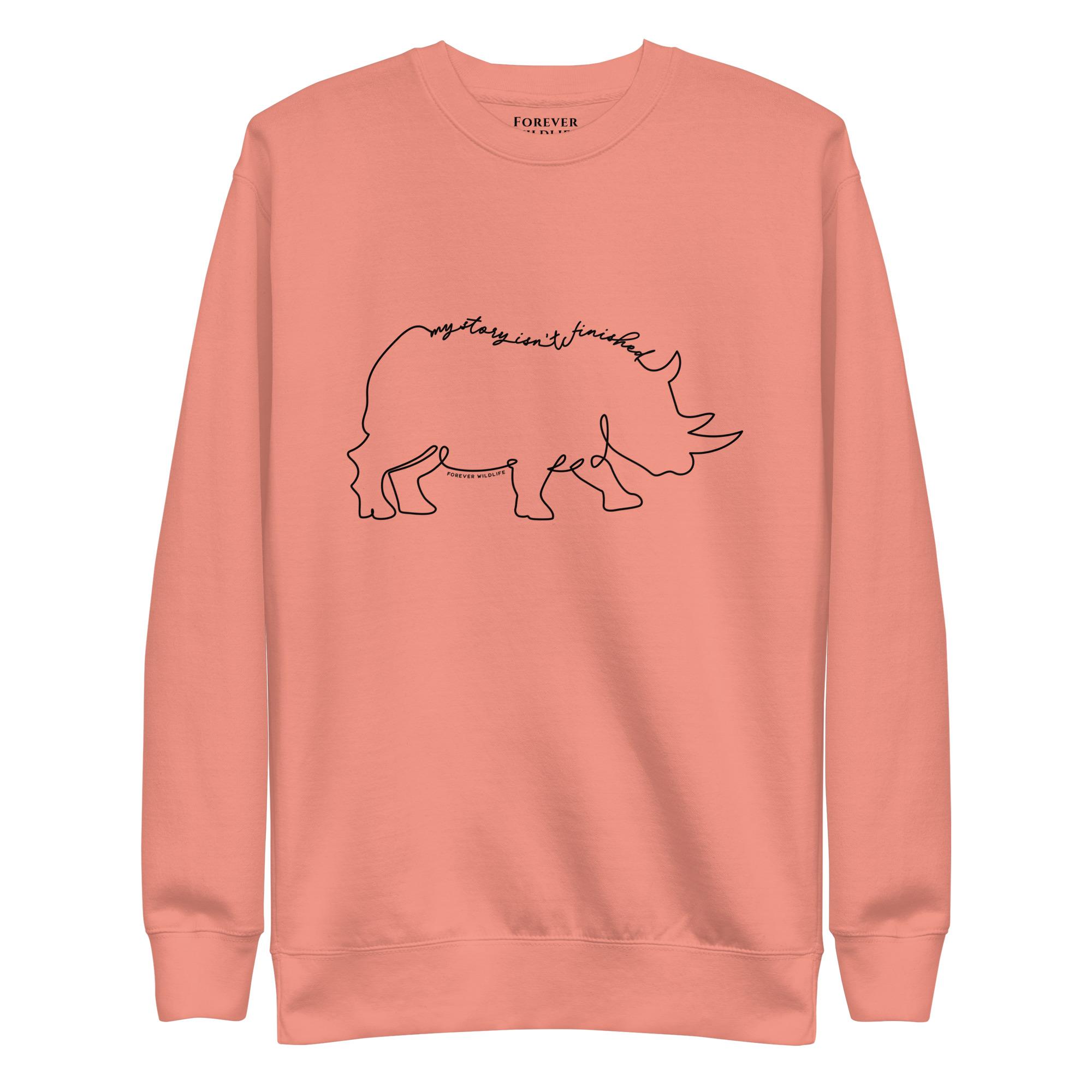 Rhino Sweatshirt in Rose-Premium Wildlife Animal Inspiration Sweatshirt Design with 'My Story Isn't Finished' text, part of Wildlife Sweatshirts & Clothing from Forever Wildlife.