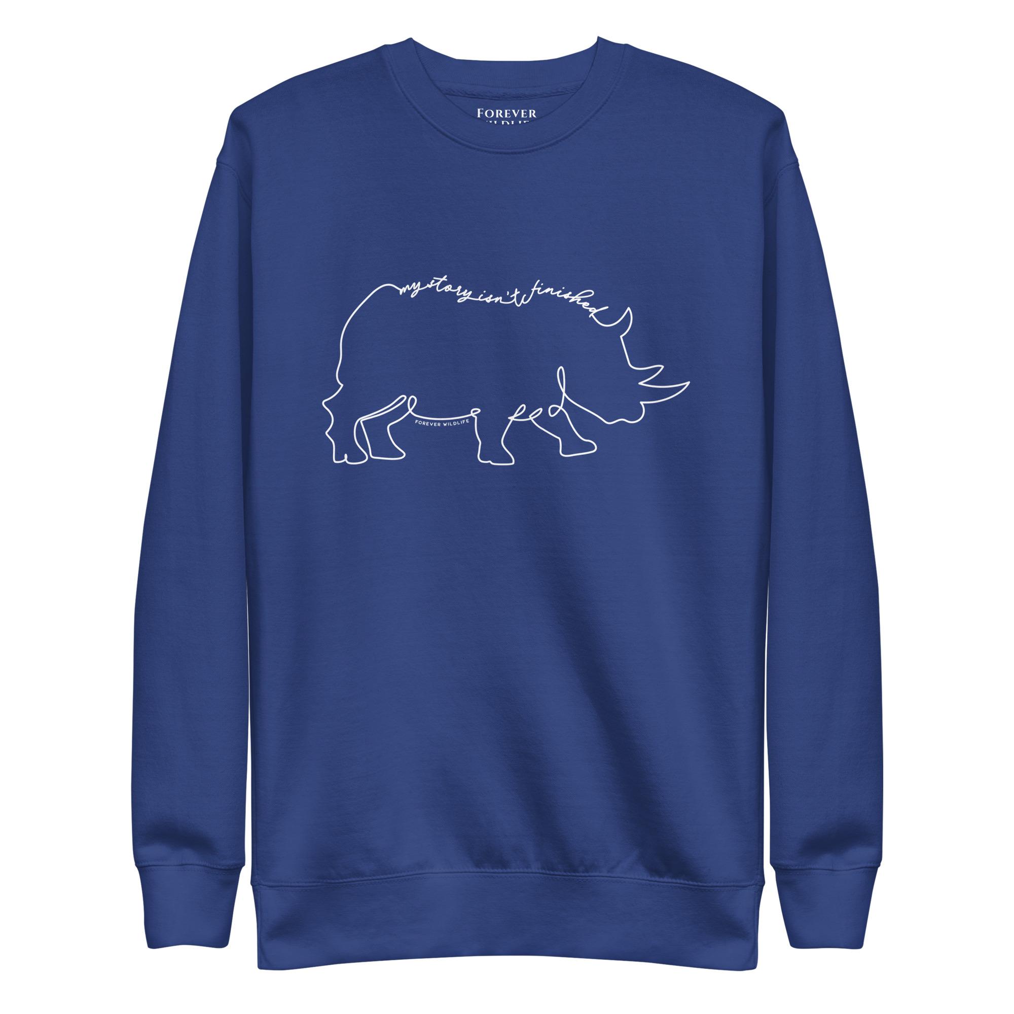 Rhino Sweatshirt in Royal-Premium Wildlife Animal Inspiration Sweatshirt Design with 'My Story Isn't Finished' text, part of Wildlife Sweatshirts & Clothing from Forever Wildlife.