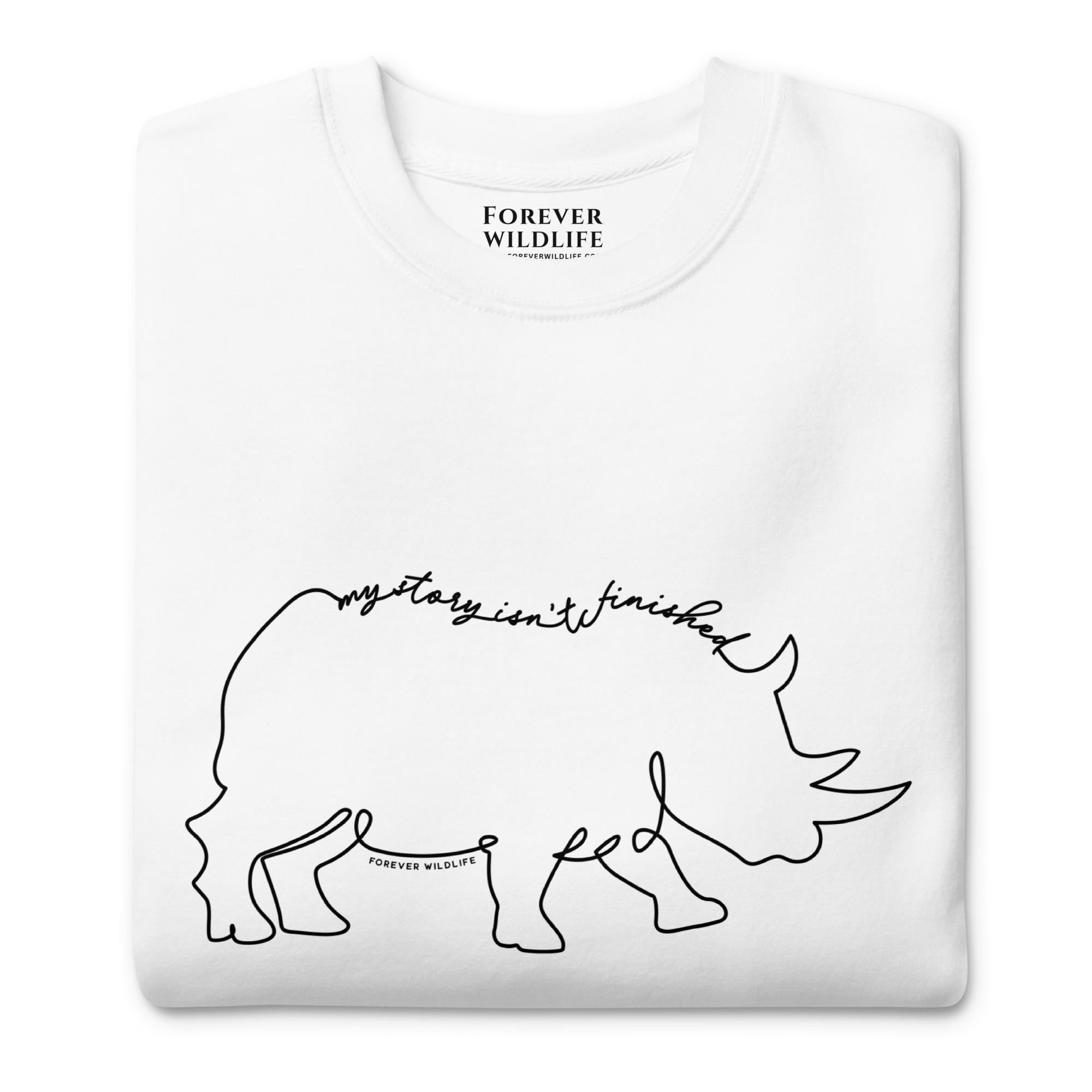 Rhino Sweatshirt in White-Premium Wildlife Animal Inspiration Sweatshirt Design with 'My Story Isn't Finished' text, part of Wildlife Sweatshirts & Clothing from Forever Wildlife.