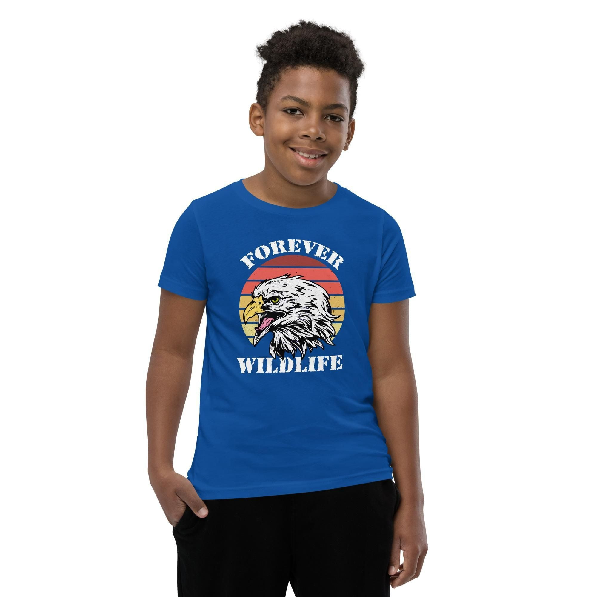 Teen wearing Blue Youth T-Shirt with Eagle graphic as part of Wildlife T Shirts, Wildlife Clothing & Apparel by Forever Wildlife